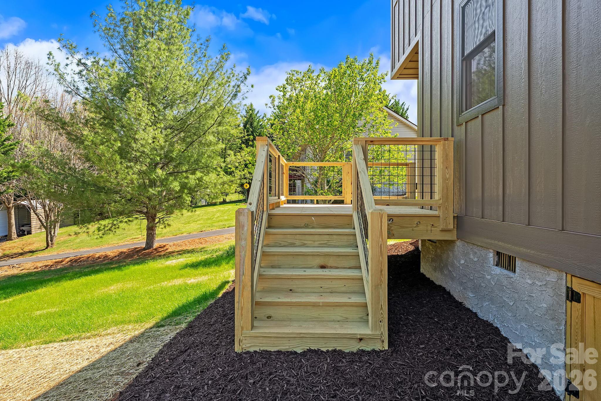 343 Olivette Road Asheville, NC 28804 - Photo 25 of 29 a view of a pathway of a house with a backyard