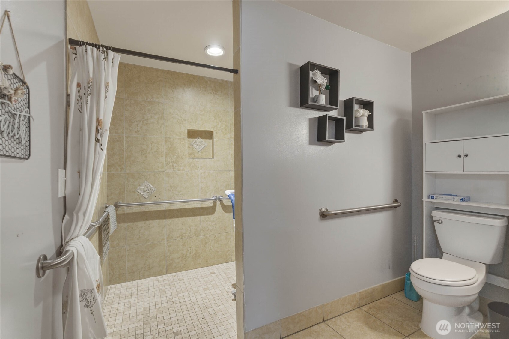 33 North Furney Street Wenatchee, WA 98801 - Photo 18 of 30 a bathroom with a toilet and a shower