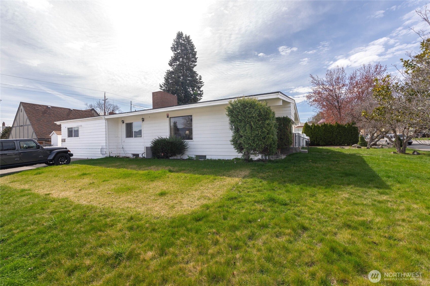 33 North Furney Street Wenatchee, WA 98801 - Photo 22 of 30 a view of house with garden space and sitting area