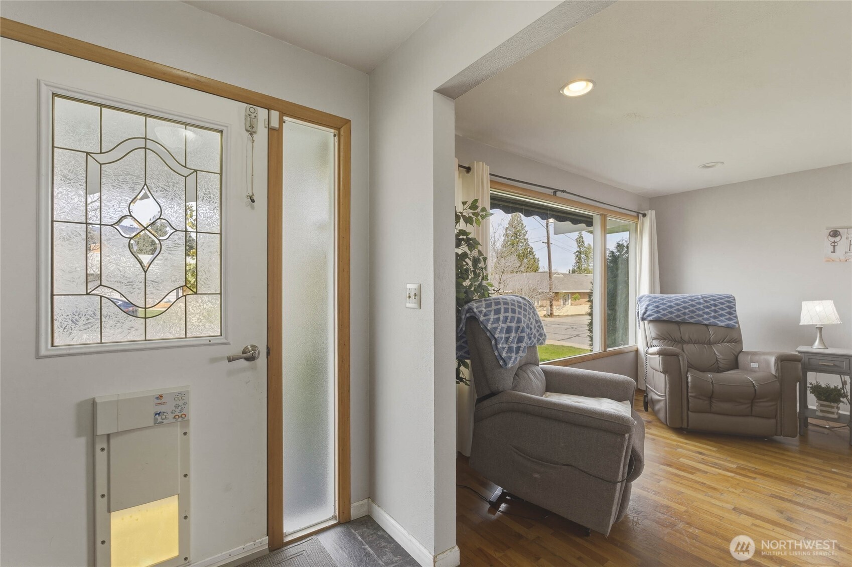 33 North Furney Street Wenatchee, WA 98801 - Photo 4 of 30 a living room with furniture and a large window