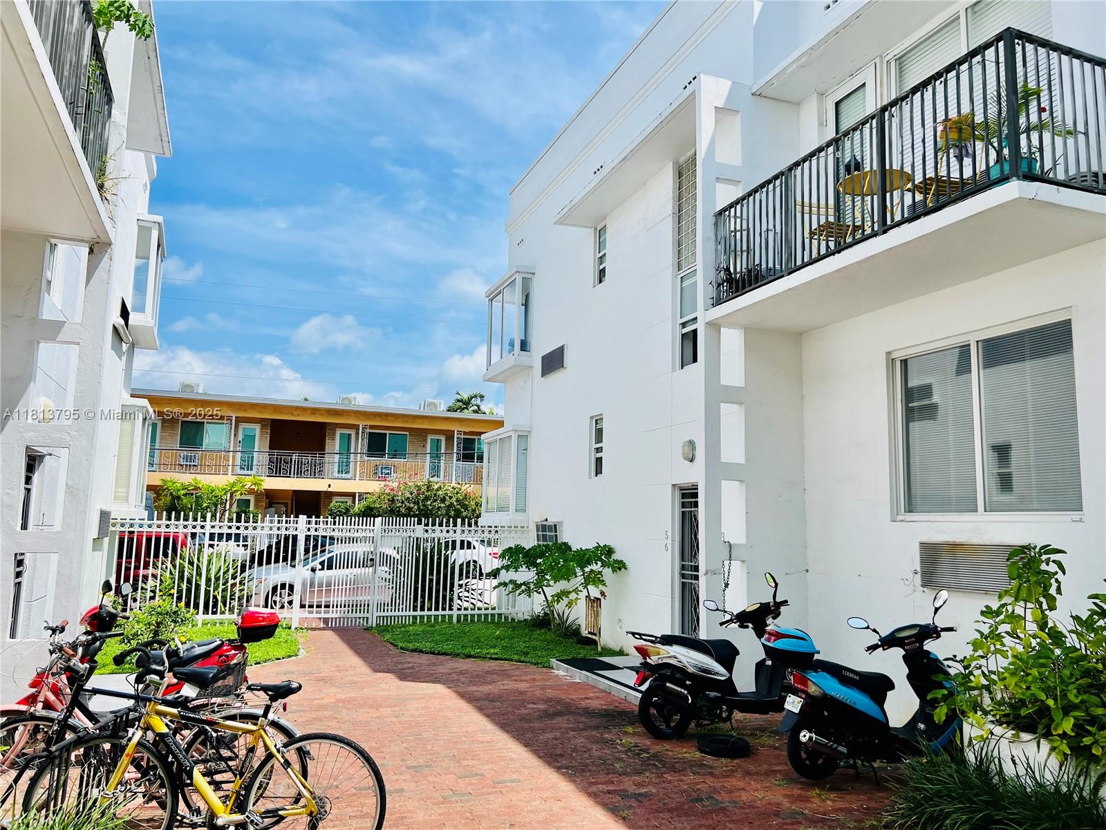 320 80th Street, Unit 6 Miami Beach, FL 33141 - Photo 32 of 33 a view of a house with sitting area and furniture