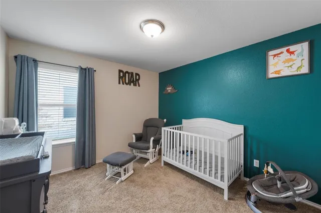 a view of a workspace with furniture and toys