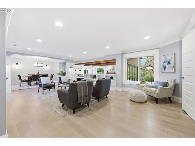 a dining room with furniture window and outside view