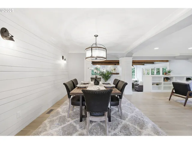 a living room with furniture and a walk in closet