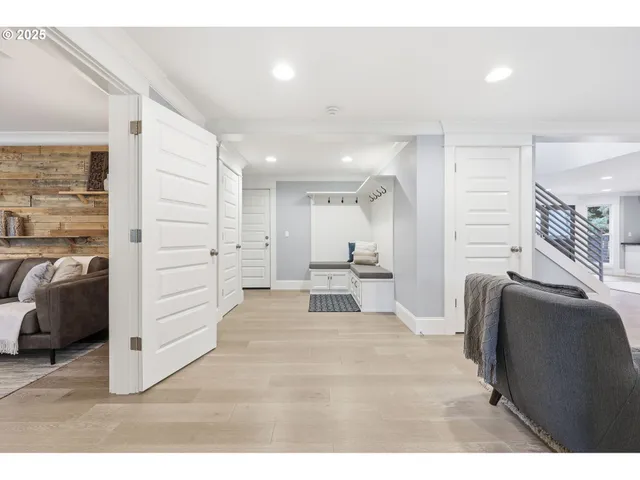 a bathroom with a granite countertop sink toilet a large mirror a shower and vanity