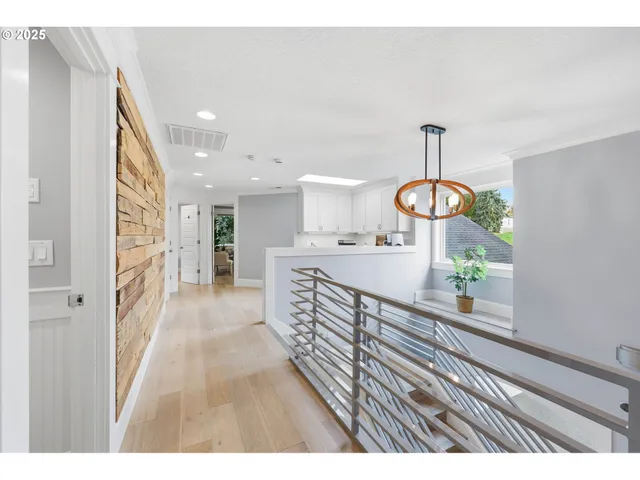 a bedroom with a bed and a table