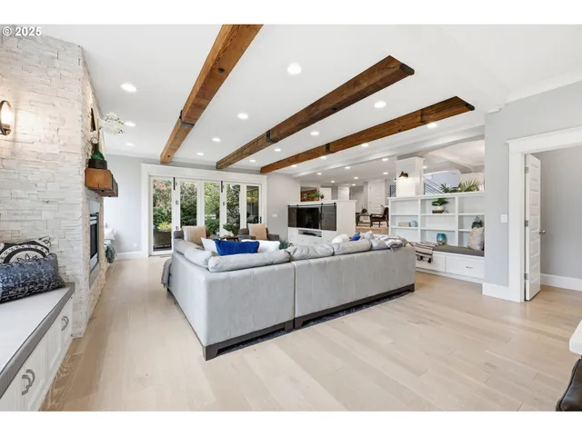 a kitchen with kitchen island a sink counter top space appliances and cabinets