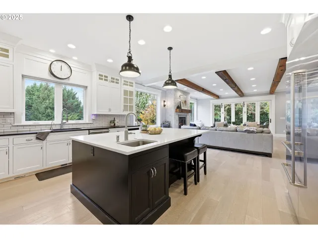 a kitchen with a sink and window