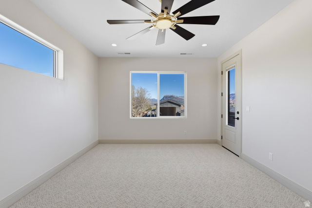 226 East 1100 North Hurricane, UT 84737 - Photo 36 of 49 Unfurnished room with a ceiling fan, light carpet, and recessed lighting