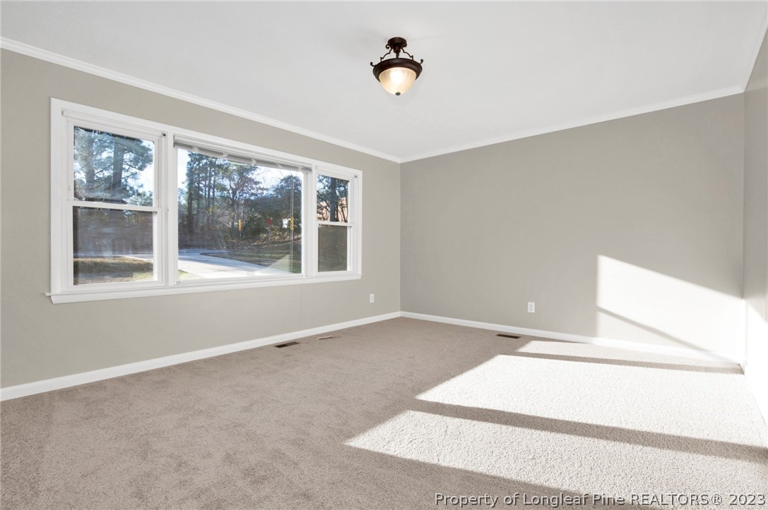 610 Arrowood Road Fayetteville, NC 28311 - Photo 13 of 26 a view of an empty room with a window