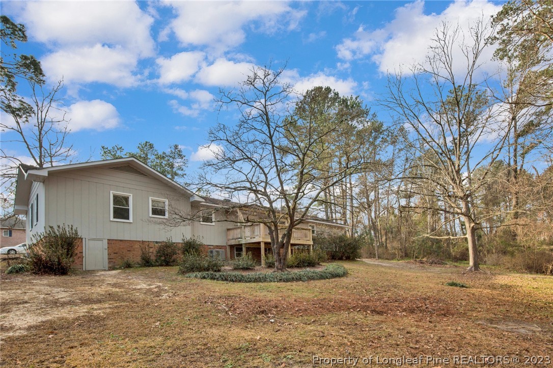 610 Arrowood Road Fayetteville, NC 28311 - Photo 2 of 26 a front view of a house with a yard