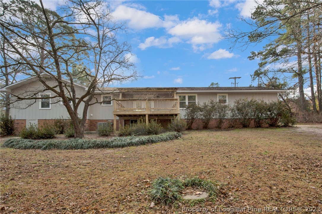 610 Arrowood Road Fayetteville, NC 28311 - Photo 3 of 26 a view of a house with a trees
