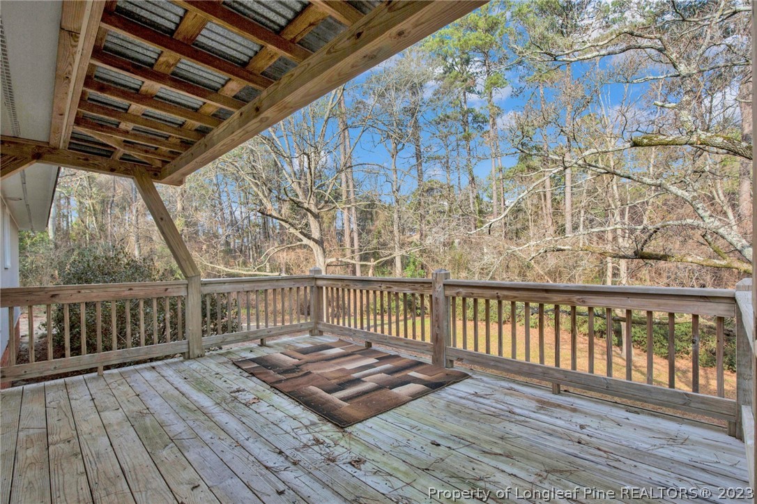 610 Arrowood Road Fayetteville, NC 28311 - Photo 8 of 26 a view of balcony with wooden floor