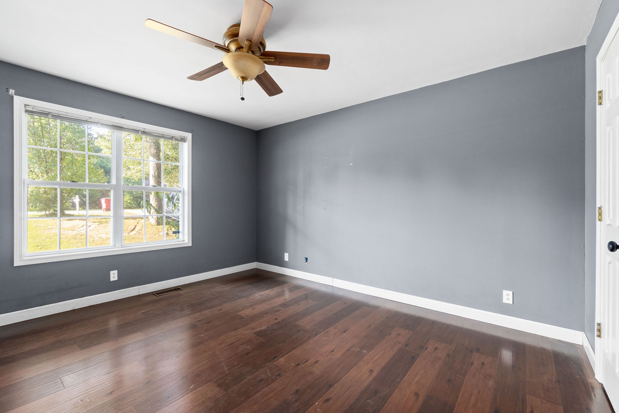 3328 Backridge Road Woodlawn, TN 37191 - Photo 15 of 28 wooden floor in an empty room with a window