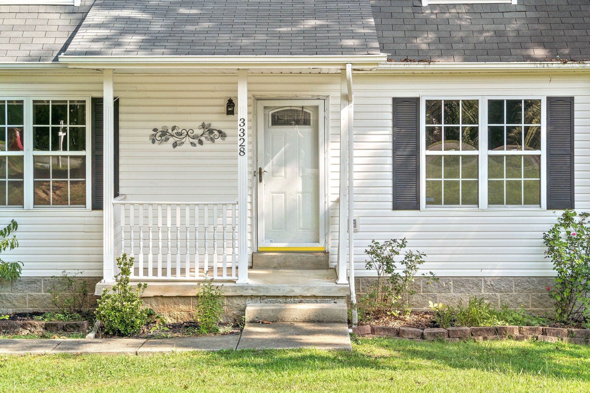 3328 Backridge Road Woodlawn, TN 37191 - Photo 3 of 28 a front view of a house with a yard