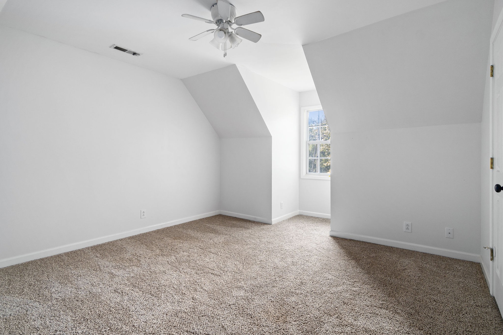 3328 Backridge Road Woodlawn, TN 37191 - Photo 21 of 28 a view of an empty room with a window