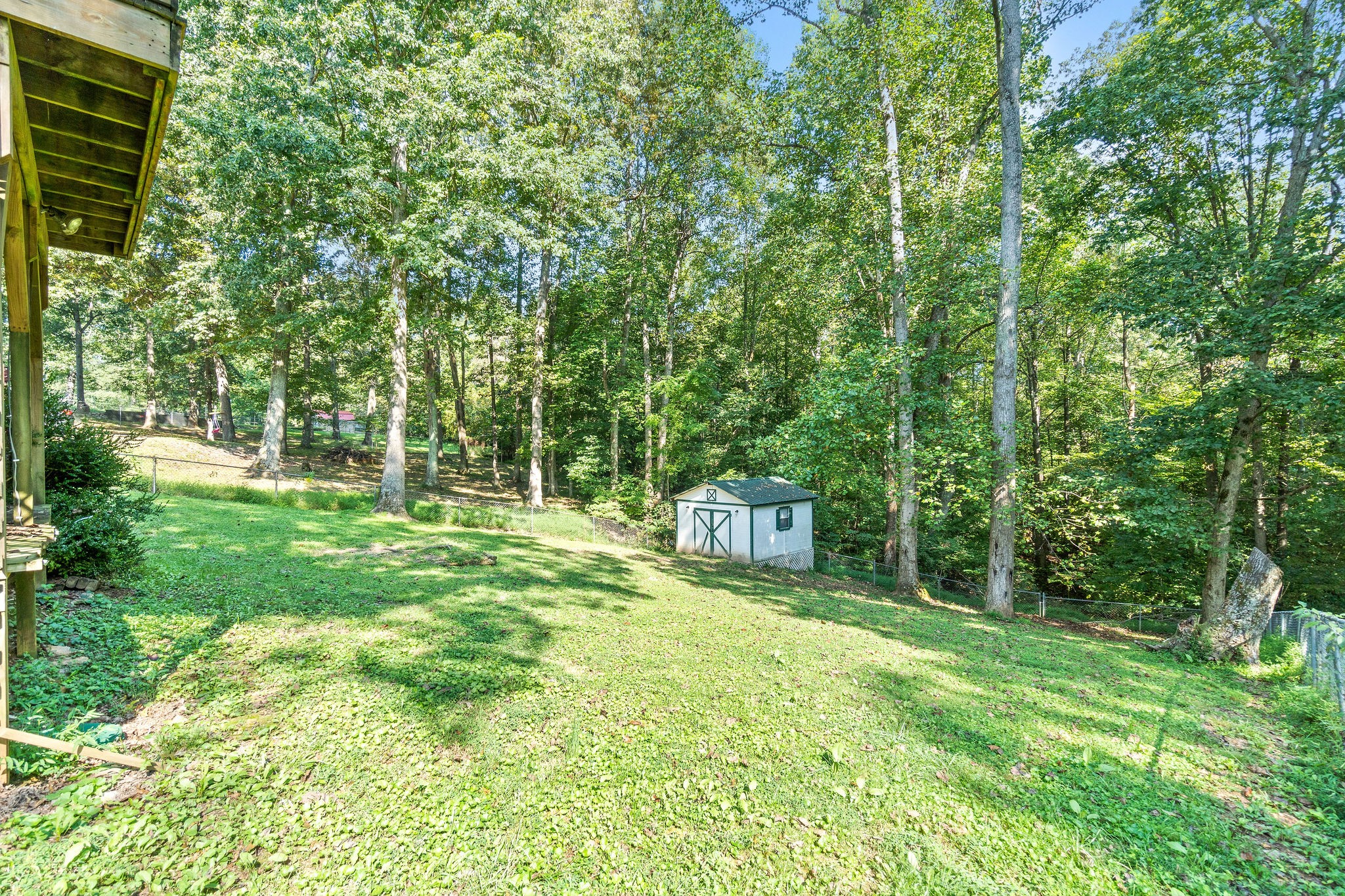 3328 Backridge Road Woodlawn, TN 37191 - Photo 24 of 28 a view of an house with backyard space and balcony