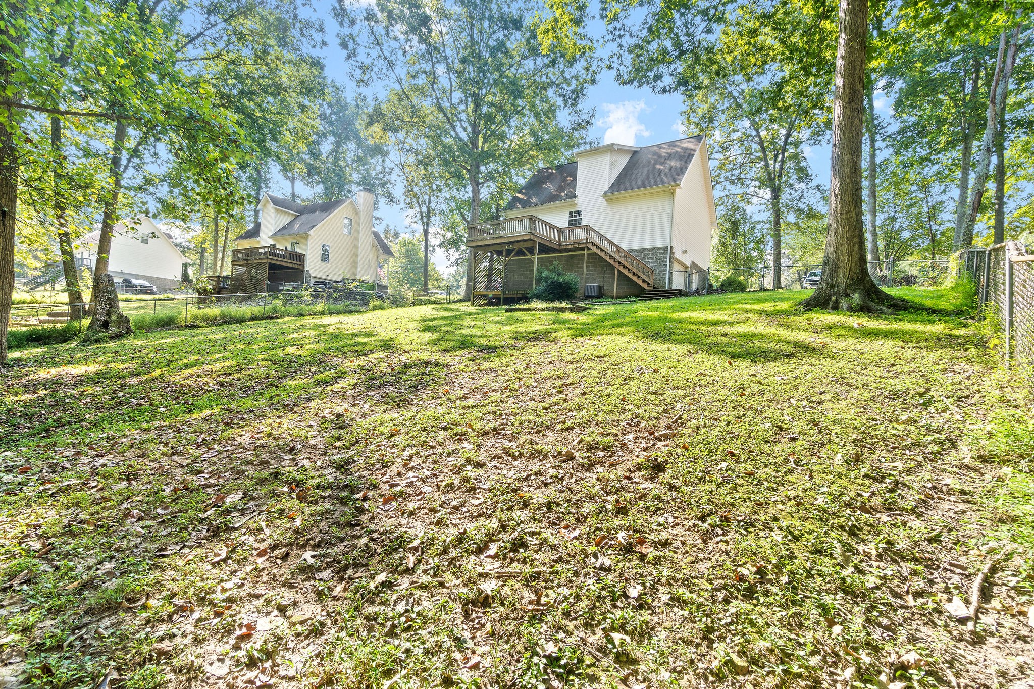 3328 Backridge Road Woodlawn, TN 37191 - Photo 28 of 28 a view of a house with a yard and tree s