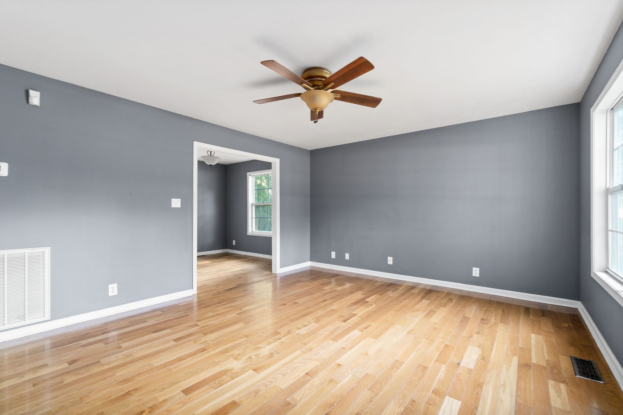 3328 Backridge Road Woodlawn, TN 37191 - Photo 6 of 28 a view of an empty room with window and wooden floor