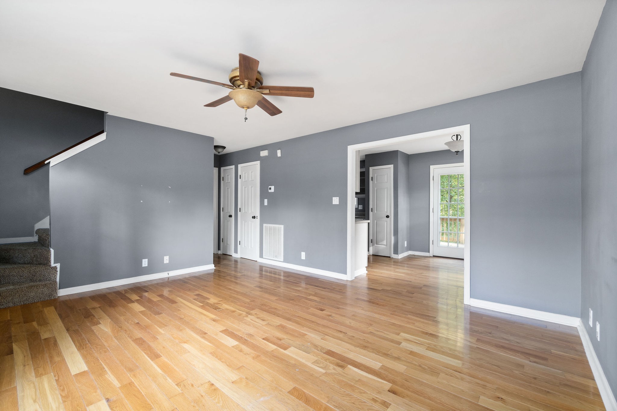 3328 Backridge Road Woodlawn, TN 37191 - Photo 7 of 28 a view of empty room with wooden floor and fan
