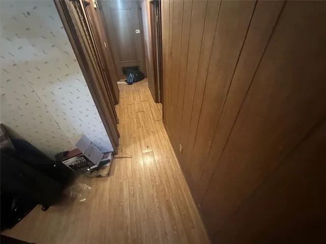 a view of balcony with wooden floor