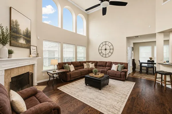 a kitchen with stainless steel appliances granite countertop a sink a stove and cabinets