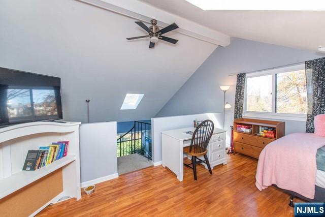 2 Falkenstein Drive, Unit 2 Vernon, NJ 07462 - Photo 18 of 24 a living room with furniture and a wooden floor