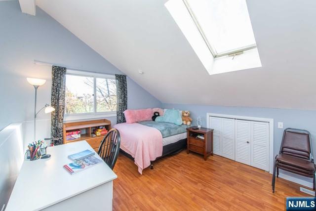 2 Falkenstein Drive, Unit 2 Vernon, NJ 07462 - Photo 19 of 24 a bedroom with two beds and a window