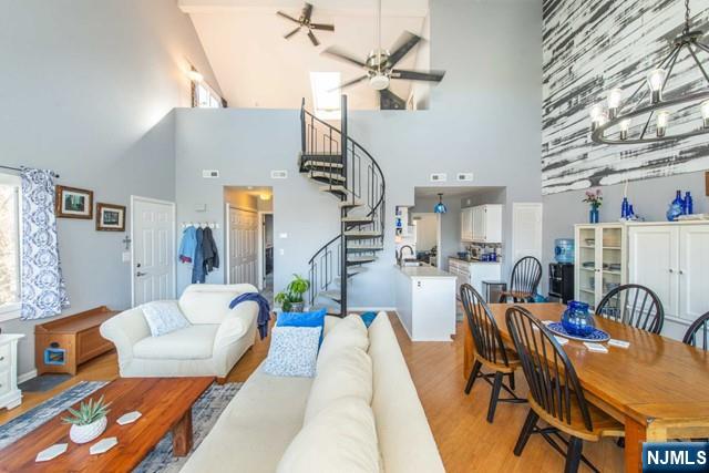 2 Falkenstein Drive, Unit 2 Vernon, NJ 07462 - Photo 3 of 24 a living room with furniture and wooden floor