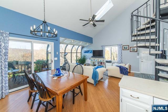 2 Falkenstein Drive, Unit 2 Vernon, NJ 07462 - Photo 6 of 24 a view of a dining room with furniture window and wooden floor