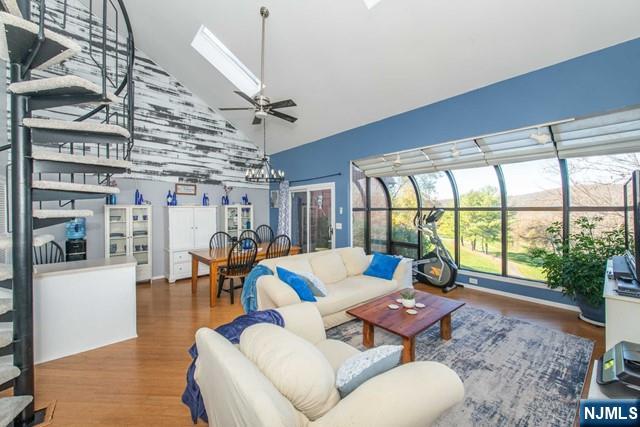 2 Falkenstein Drive, Unit 2 Vernon, NJ 07462 - Photo 7 of 24 a living room with lots of furniture and a large window