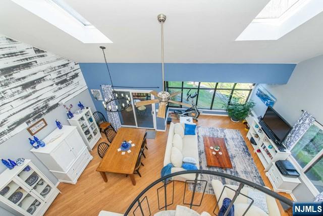 2 Falkenstein Drive, Unit 2 Vernon, NJ 07462 - Photo 9 of 24 a living room with furniture and a flat screen tv