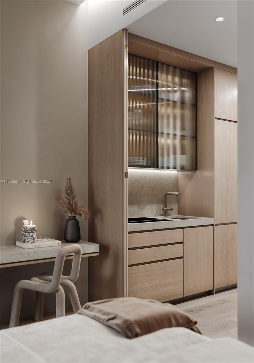 1265 Southwest 22nd Street, Unit 407 Miami, FL 33145 - Photo 4 of 17 a living room with a bed and furniture