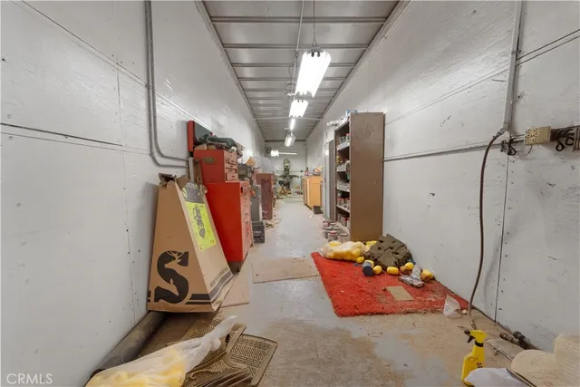a view of a house with a snow yard and a road