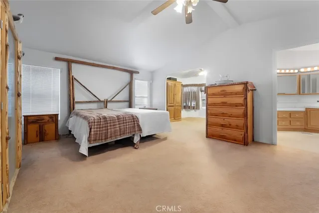 a bathroom with a sink a vanity and a mirror