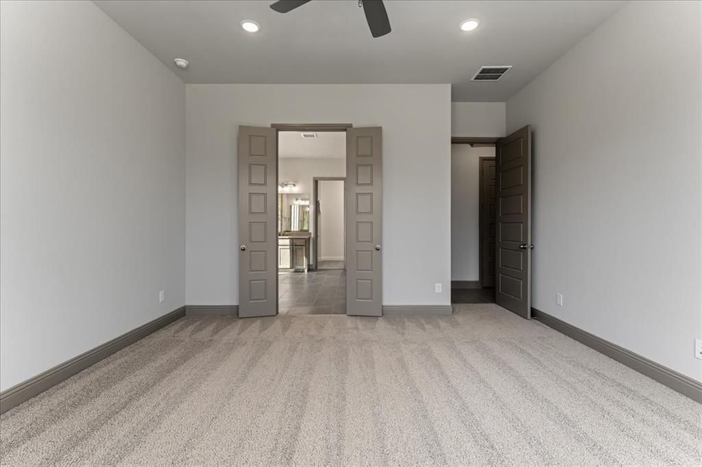 131 Spring Valley Road Paradise, TX 76073 - Photo 19 of 40 wooden floor in an empty room with a window