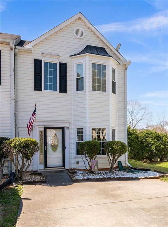 30 Hampton Drive Cartersville, GA 30121 - Photo 1 of 1 a front view of a house with garden