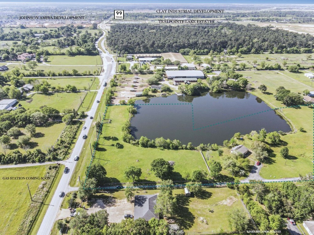 21645 Mueschke Road Tomball, TX 77377 - Photo 2 of 6 a view of lake