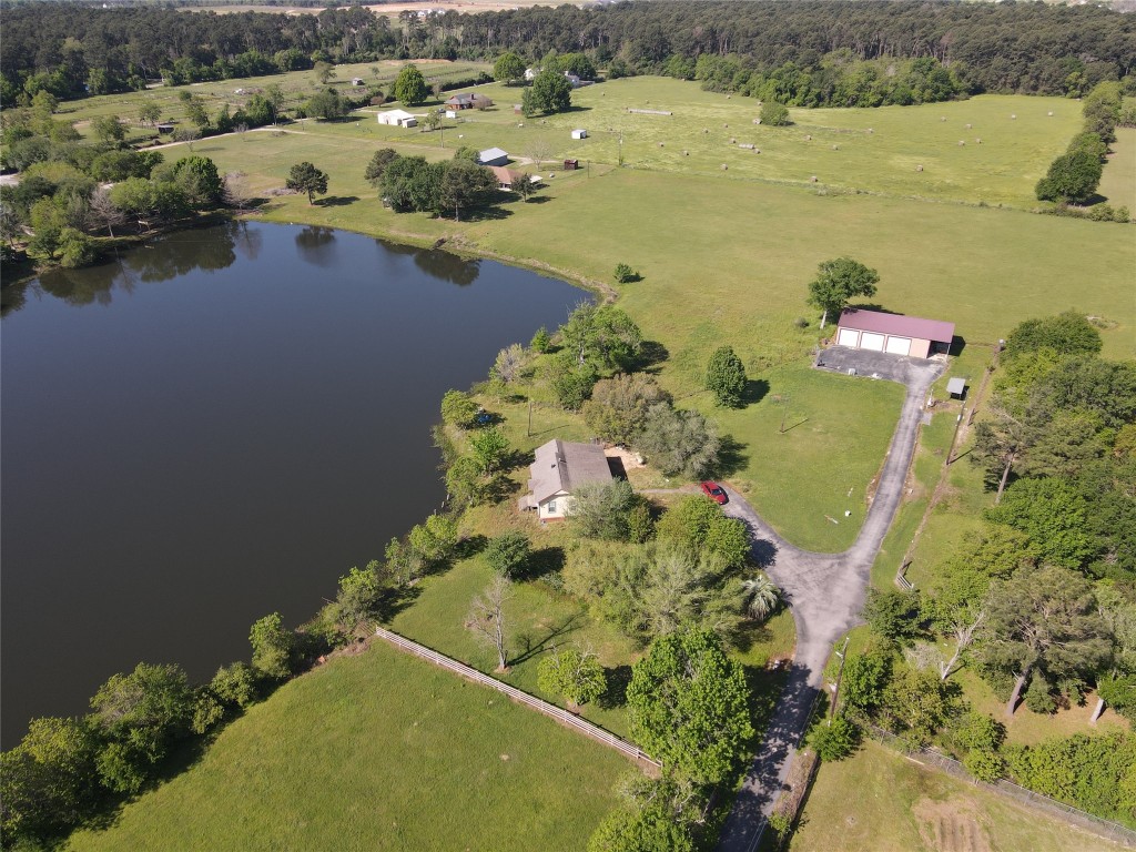 21645 Mueschke Road Tomball, TX 77377 - Photo 6 of 6 an aerial view of lake residential house with outdoor space
