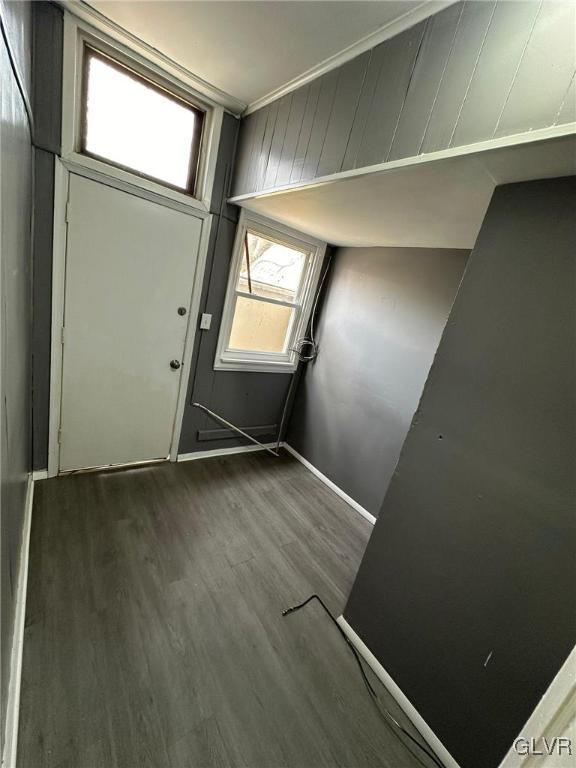 425 Liberty Street, Unit 1 Allentown, PA 18102 - Photo 8 of 13 an empty room with wooden floor and windows