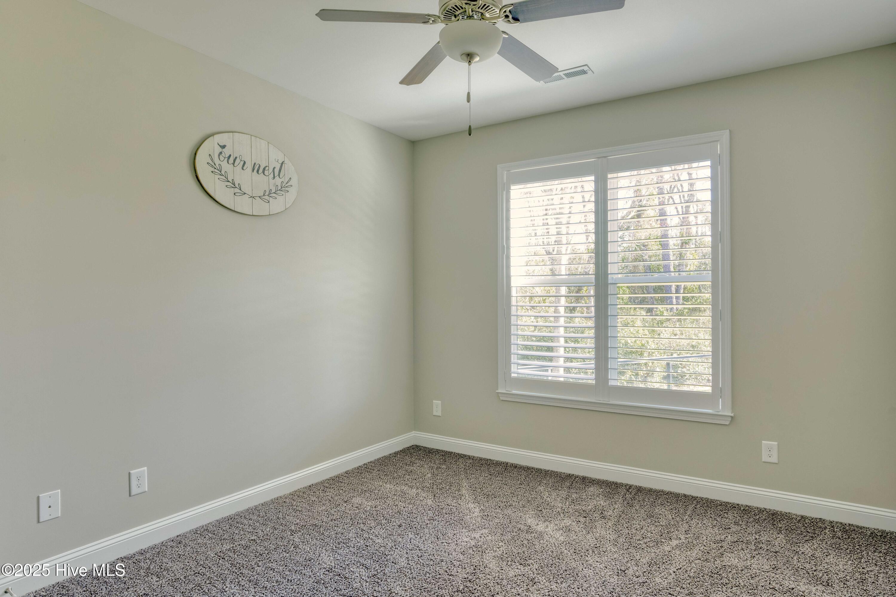 327 Bear Run Maple Hill, NC 28454 - Photo 21 of 33 First floor bedroom adjoins the first floor full bath