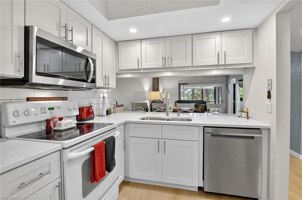 5857 Rattlesnake Hammock Road, Unit 106 Naples, FL 34113 - Photo 1 of 17 Gallery Image 1