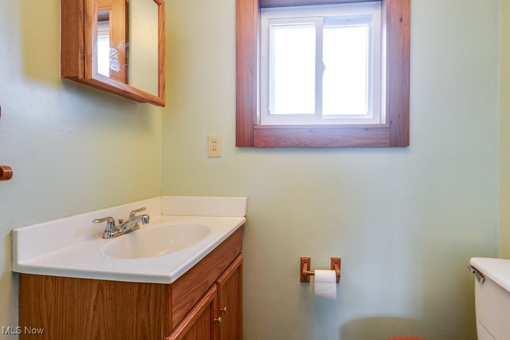 516 Floyd Street Akron, OH 44310 - Photo 17 of 50 Half bath with toilet and vanity