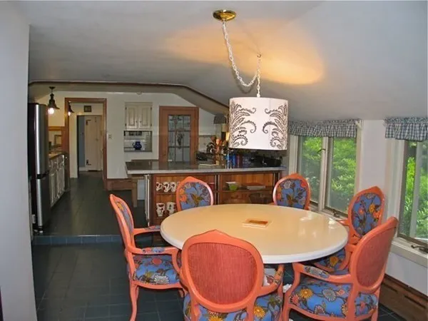 a kitchen with stainless steel appliances a refrigerator and a sink