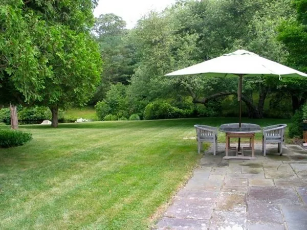 a view of a lake with a yard