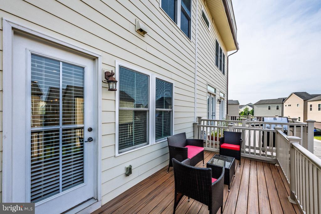 20649 Duxbury Terrace Ashburn, VA 20147 - Photo 16 of 41 a view of a deck with furniture