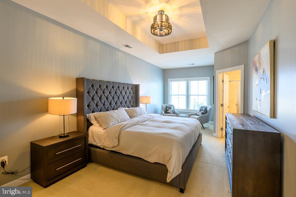 20649 Duxbury Terrace Ashburn, VA 20147 - Photo 23 of 41 a bedroom with a bed and window