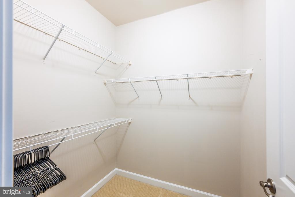 20649 Duxbury Terrace Ashburn, VA 20147 - Photo 24 of 41 a view of a room with racks on the wall