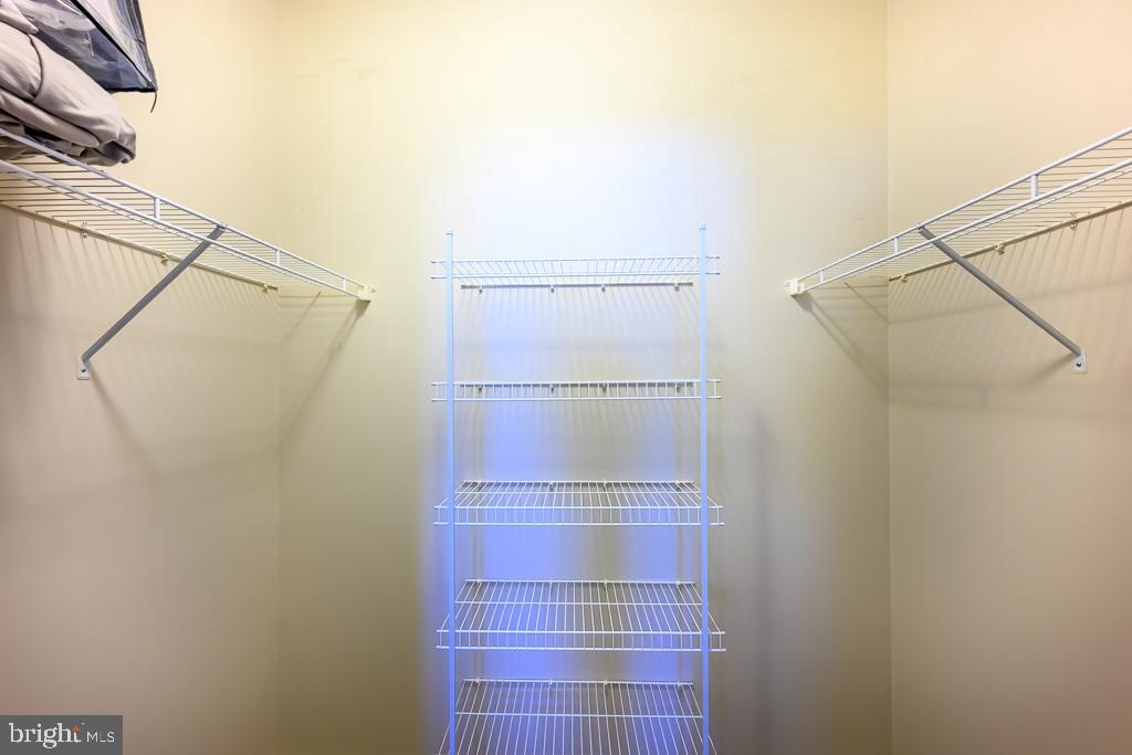 20649 Duxbury Terrace Ashburn, VA 20147 - Photo 25 of 41 a bathroom with a glass door shower