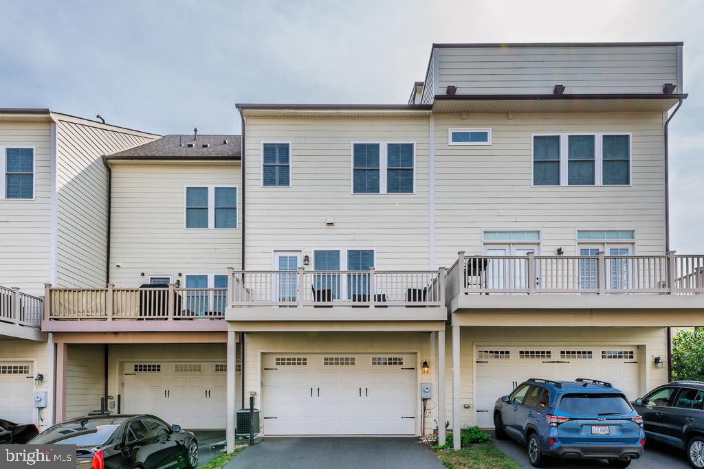 20649 Duxbury Terrace Ashburn, VA 20147 - Photo 32 of 41 a car parked in front of a building